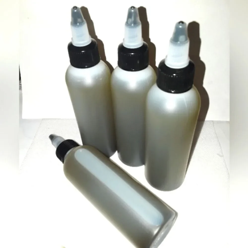 HAND crafted Neem and Amla hair and body oil